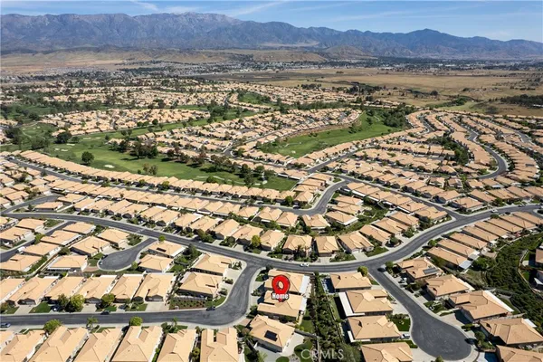 an aerial view of a city with lots of residential buildings