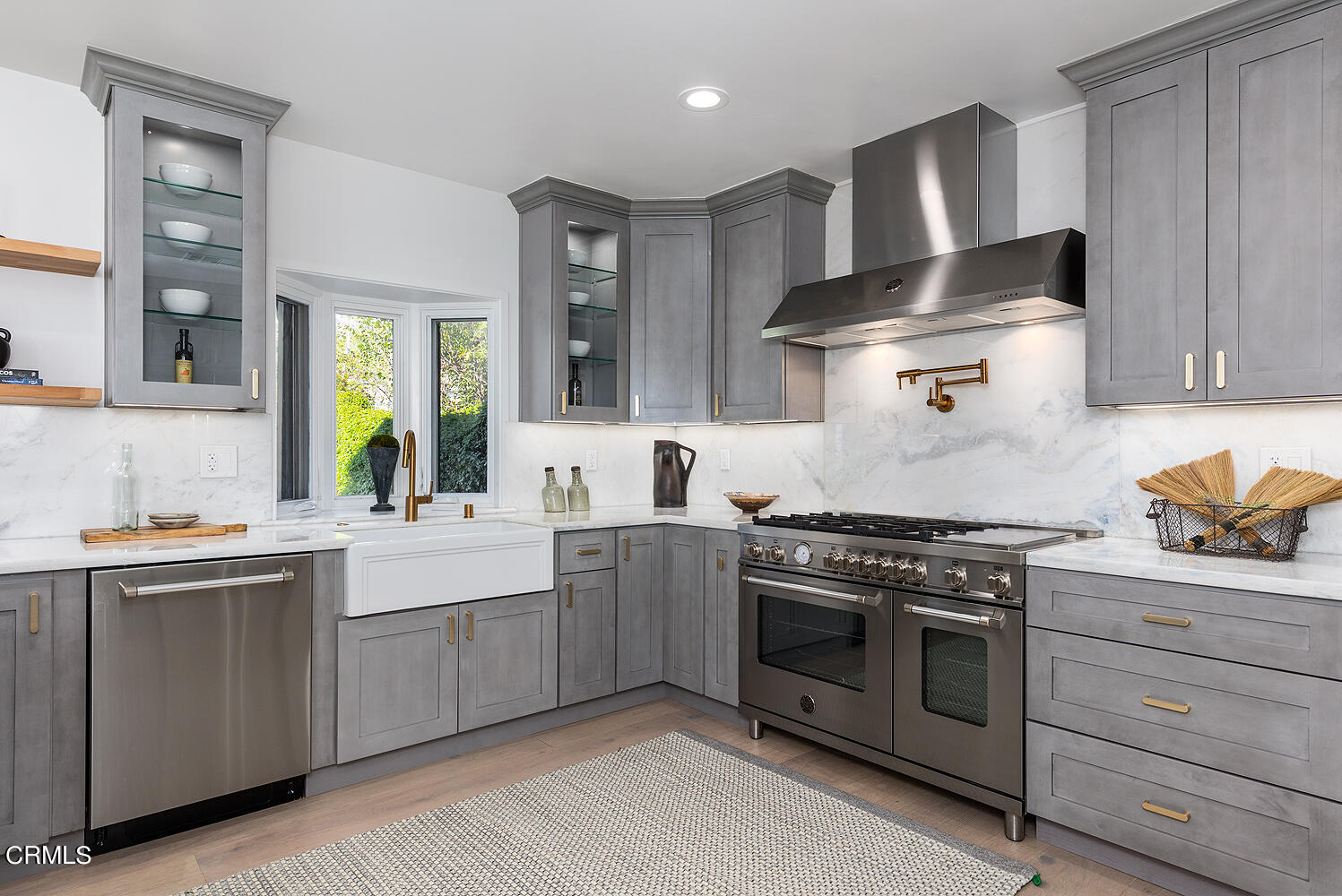 3142 Lincoln Avenue Altadena, CA 91001 - Photo 12 of 48 a kitchen with stainless steel appliances a stove and cabinets