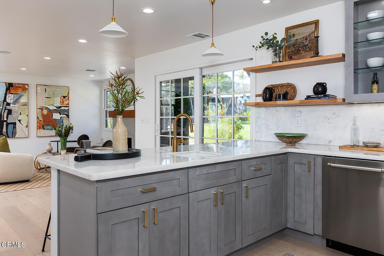 3142 Lincoln Avenue Altadena, CA 91001 - Photo 13 of 48 a kitchen with a sink dishwasher and white cabinets with wooden floor