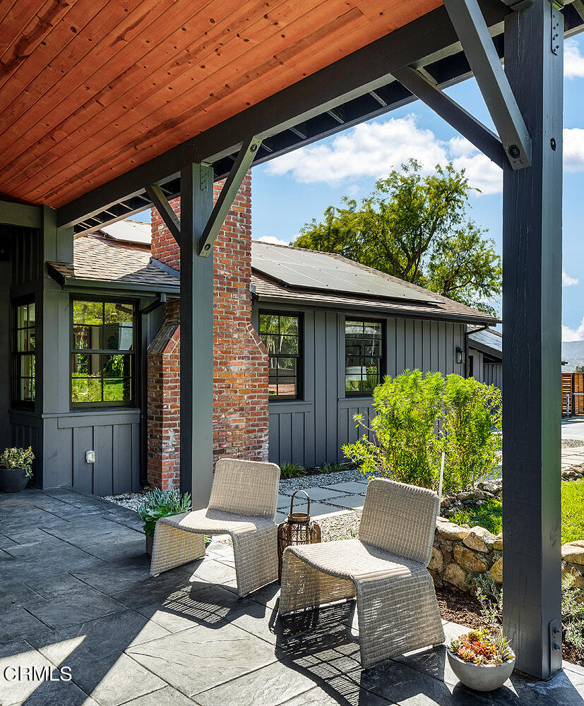 3142 Lincoln Avenue Altadena, CA 91001 - Photo 36 of 48 a view of a patio with couches chairs and potted plants