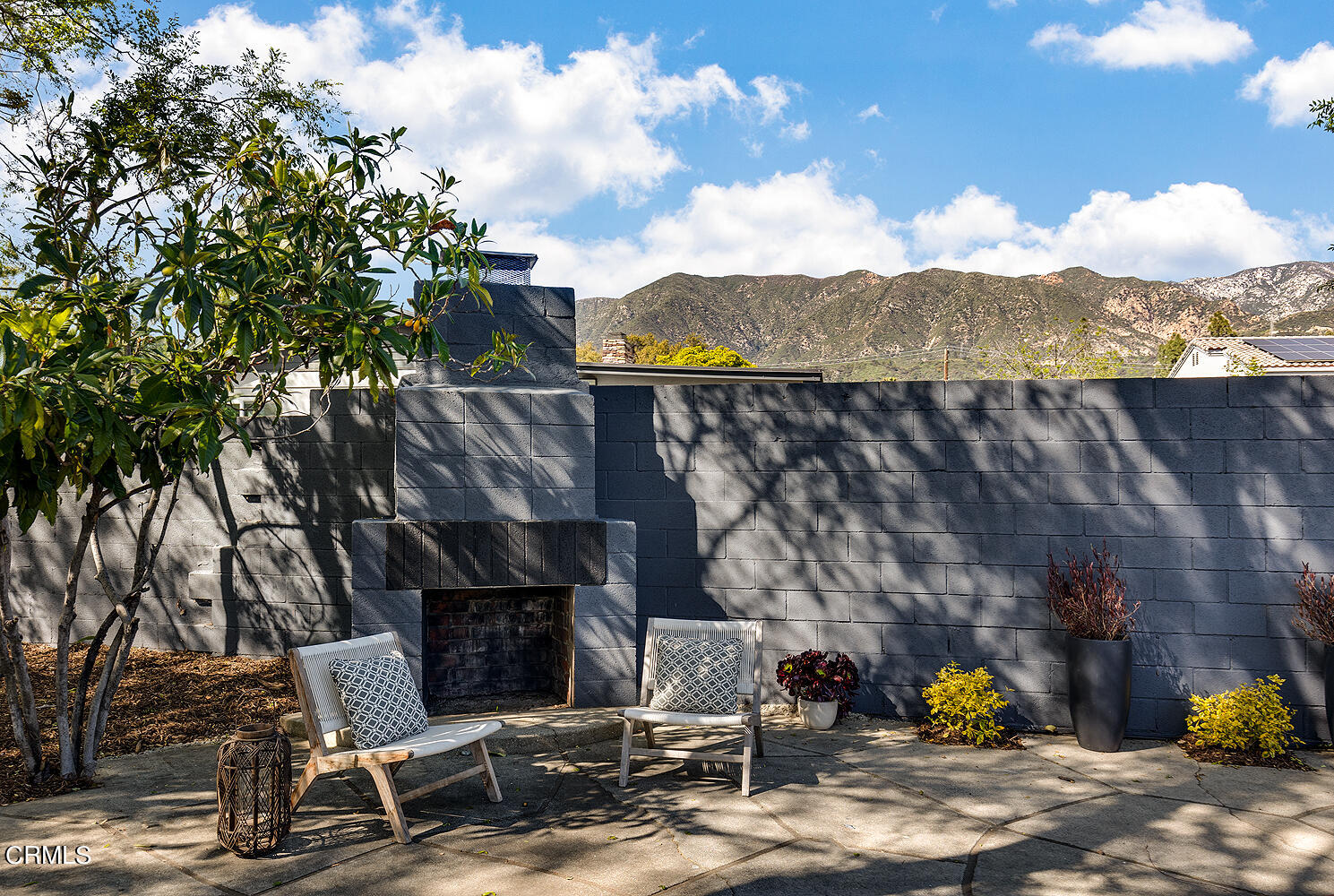 3142 Lincoln Avenue Altadena, CA 91001 - Photo 37 of 48 a view of a patio with table and chairs and a fire pit