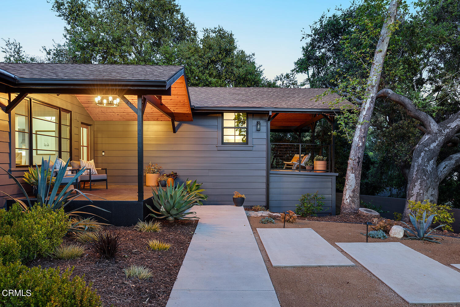 3142 Lincoln Avenue Altadena, CA 91001 - Photo 44 of 48 a view of a house with potted plants next to a road