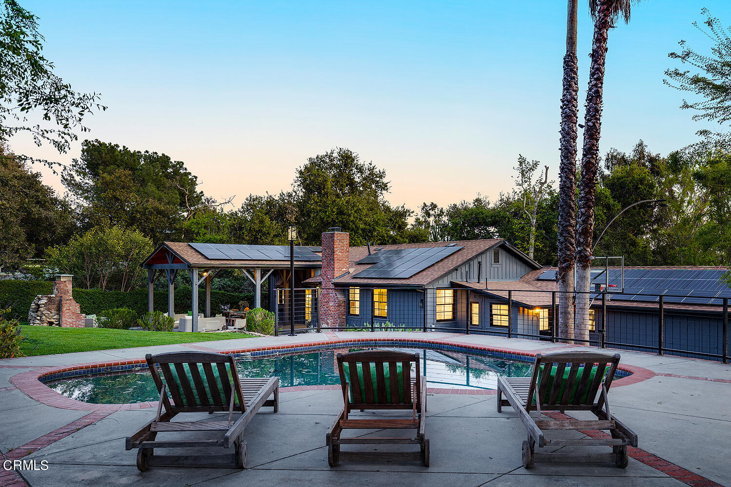 3142 Lincoln Avenue Altadena, CA 91001 - Photo 48 of 48 a view of a brick house with a chairs and table in the patio
