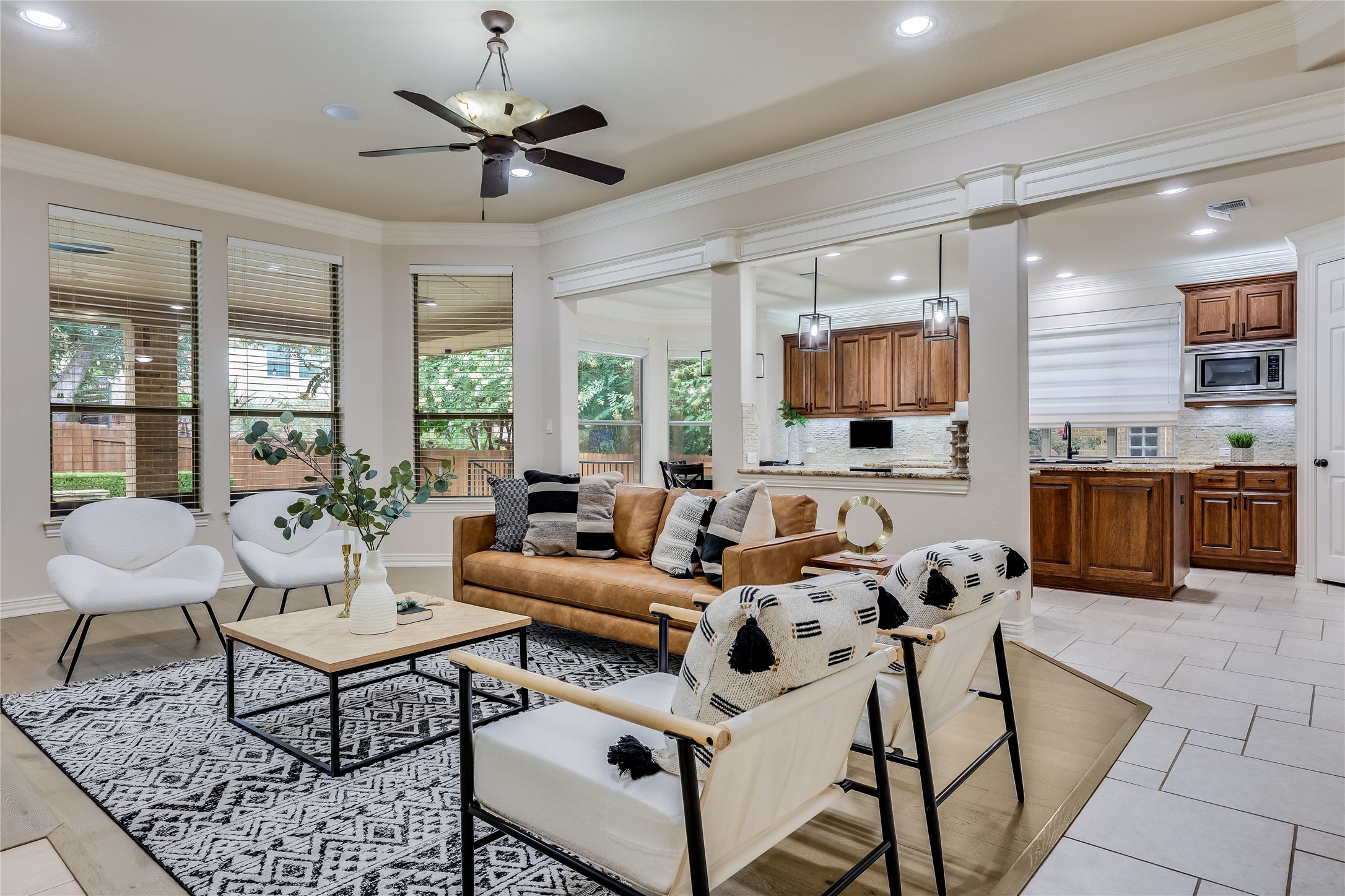 408 Ridgetop Bend Cedar Park, TX 78613 - Photo 40 of 40 An open floorplan seamlessly connects the living area to a well-appointed kitchen, ideal for entertaining.