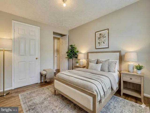 a view of a park with swings and slides