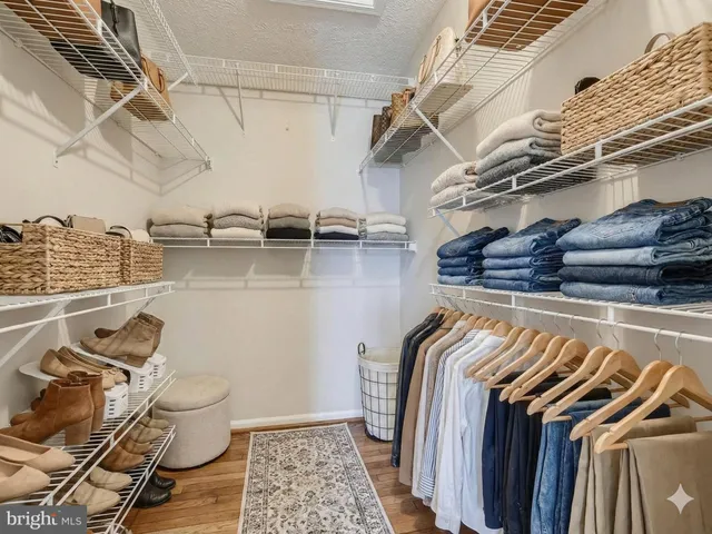 a view of a room with racks on the wall