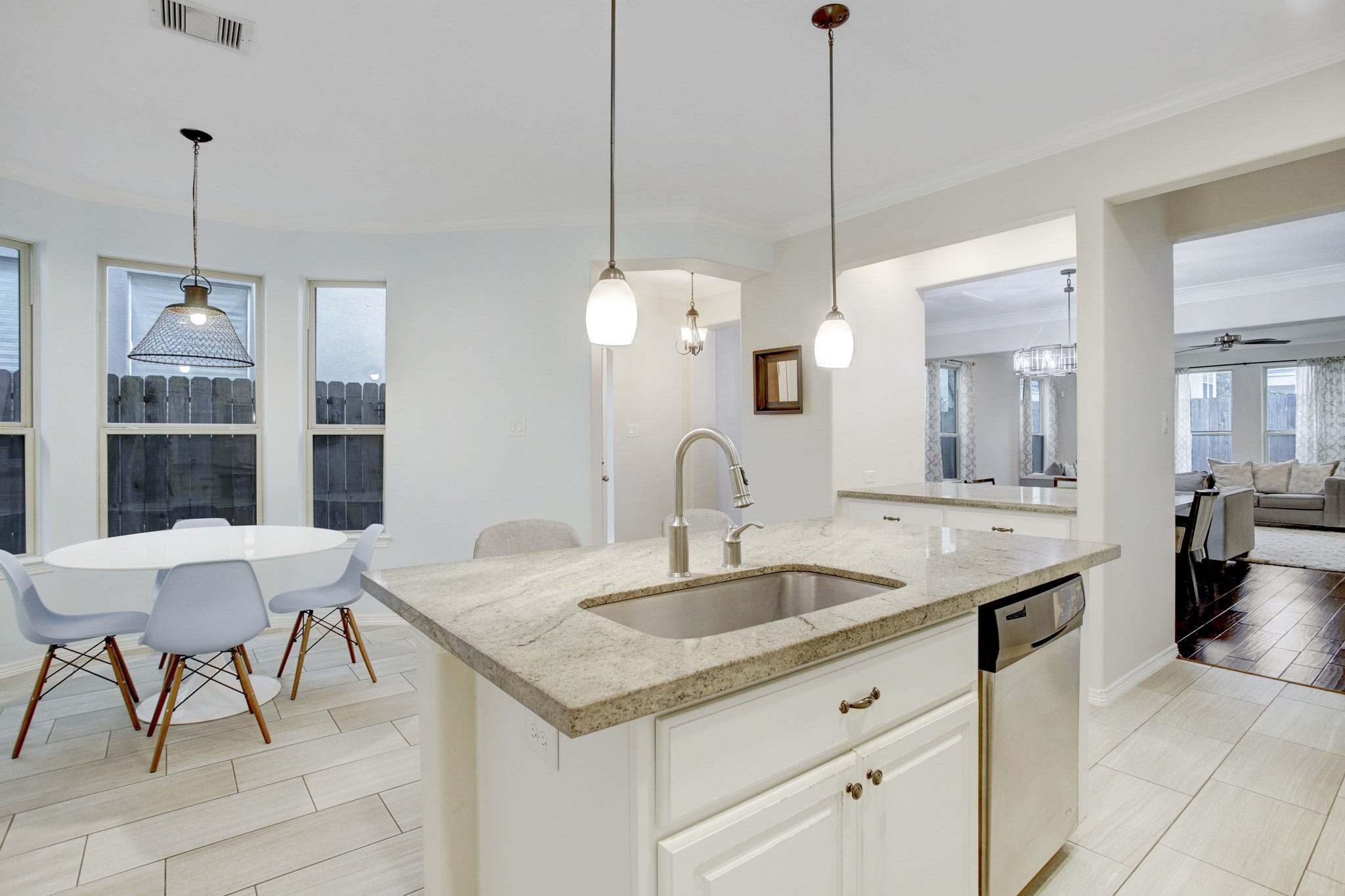 4230 Drake Street Houston, TX 77005 - Photo 38 of 38 Kitchen – This view highlights the open floor plan. The layout affords you the ability to keep an eye on your family while preparing meals.