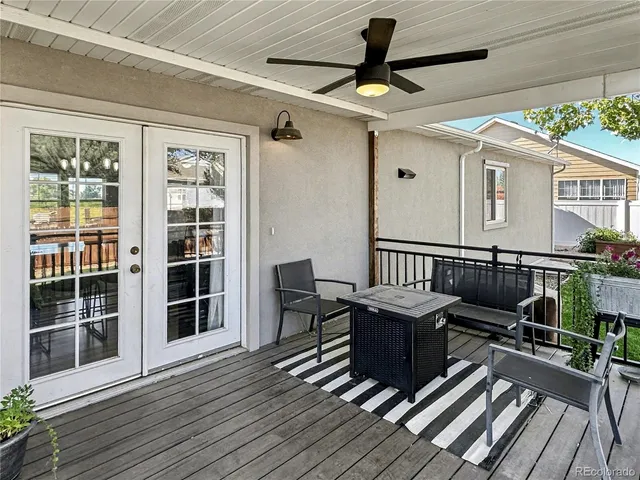 a view of a balcony with furniture