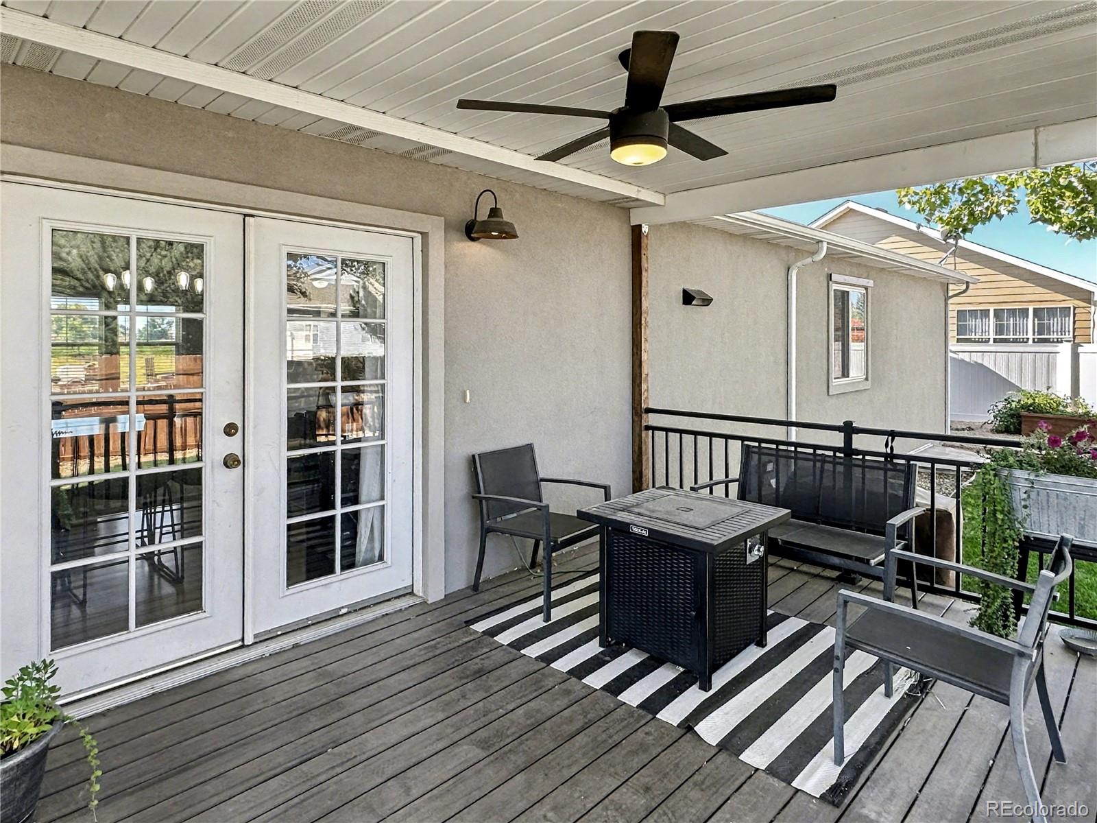 804 Nicole Road Sterling, CO 80751 - Photo 16 of 24 a view of a balcony with furniture