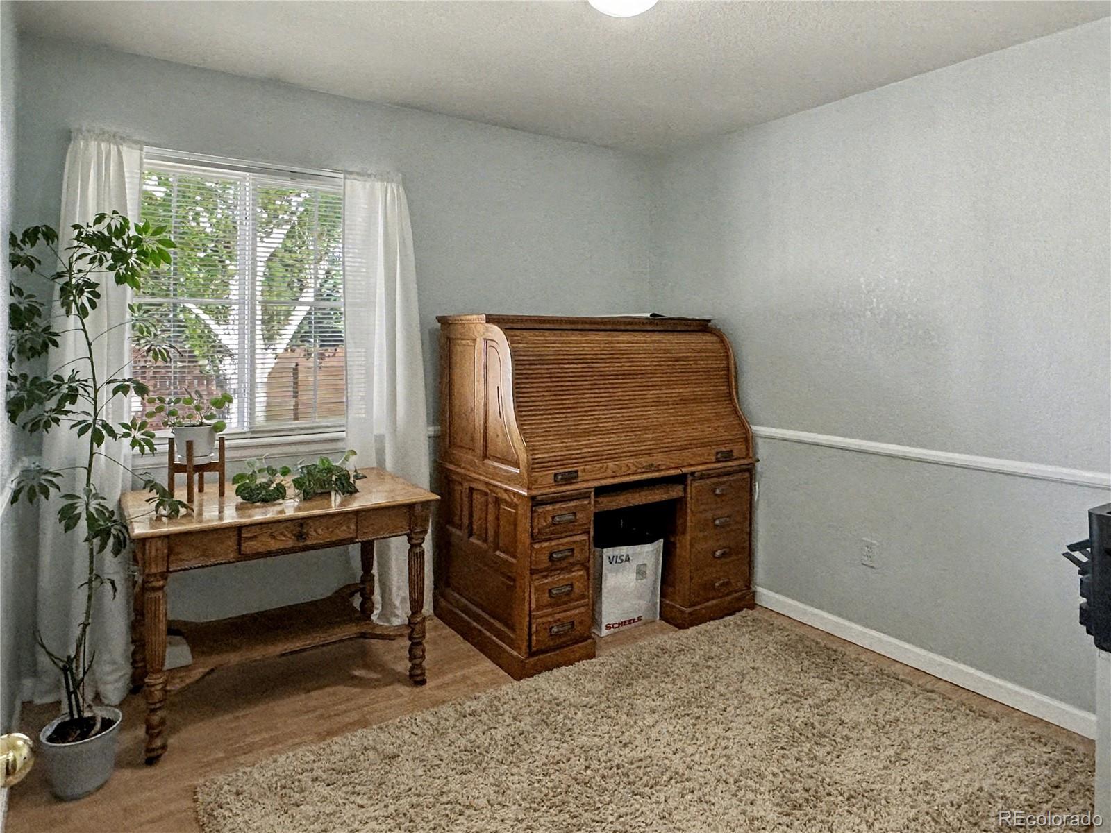 804 Nicole Road Sterling, CO 80751 - Photo 10 of 24 a living room with furniture
