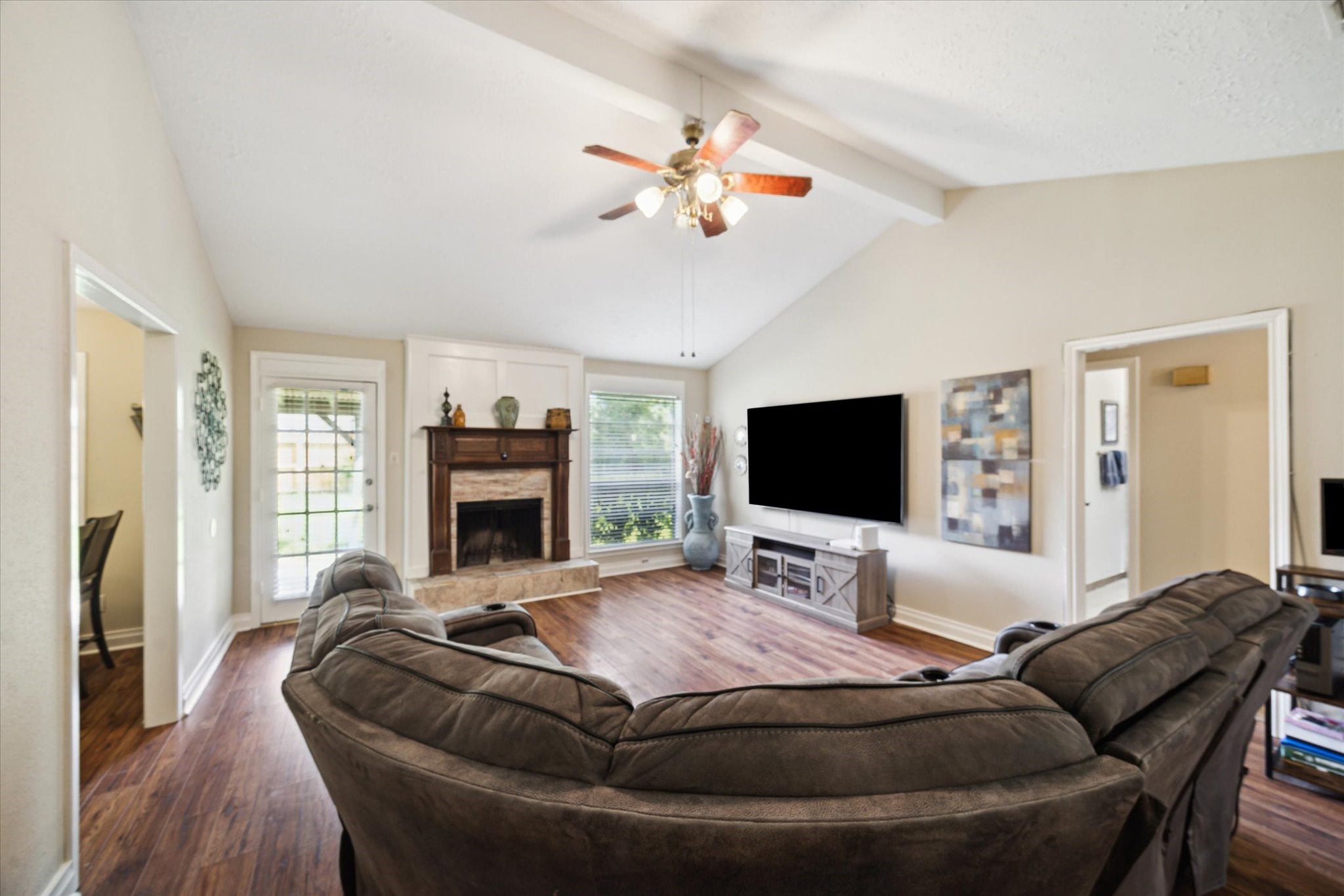 4226 Mossygate Drive Spring, TX 77373 - Photo 1 of 16 Family Room (angle 1)
Cozy living area with vaulted ceiling, ceiling fan, and a custom antique fireplace mantle