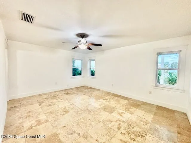 a view of a hallway to a bedroom