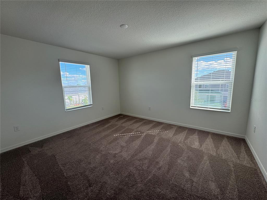 3820 Elk Blf Road St. Cloud, FL 34772 - Photo 13 of 23 an empty room with a window