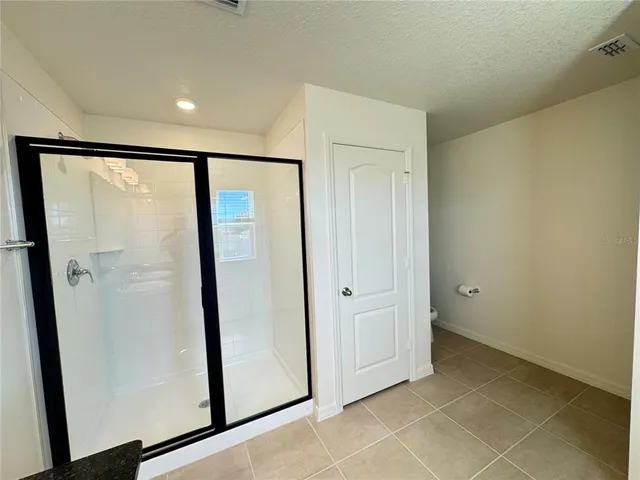 a view of a hallway with closet area
