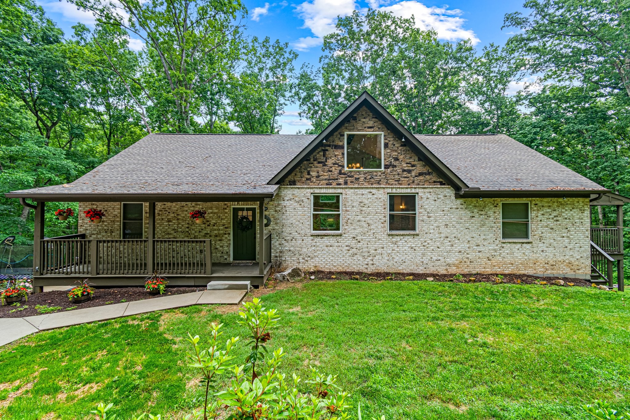 4545 Sears Road Pegram, TN 37143 - Photo 1 of 68 a front view of a house with a yard