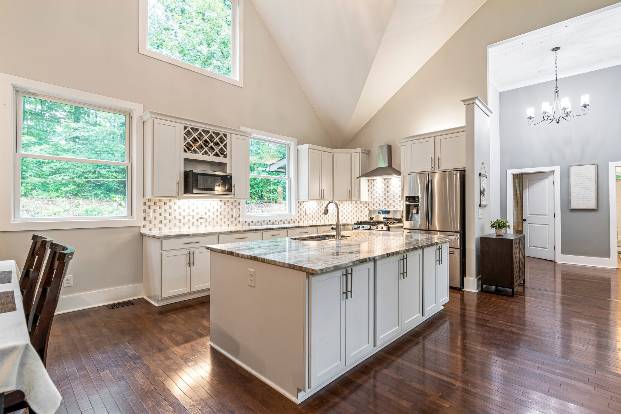 4545 Sears Road Pegram, TN 37143 - Photo 17 of 68 a kitchen with kitchen island granite countertop a stove and a sink