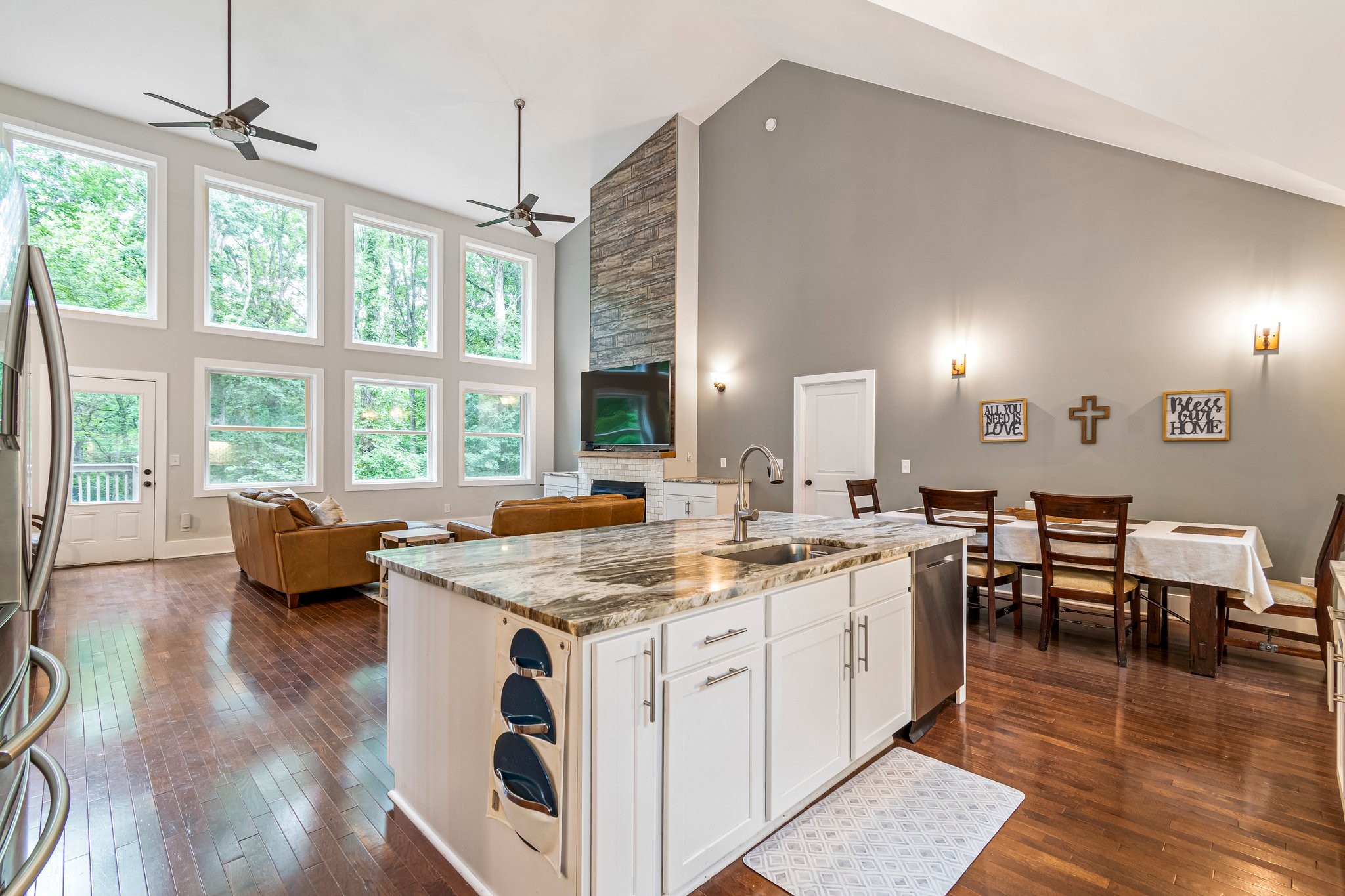 4545 Sears Road Pegram, TN 37143 - Photo 21 of 68 a open kitchen with stainless steel appliances granite countertop a stove and a view of living room