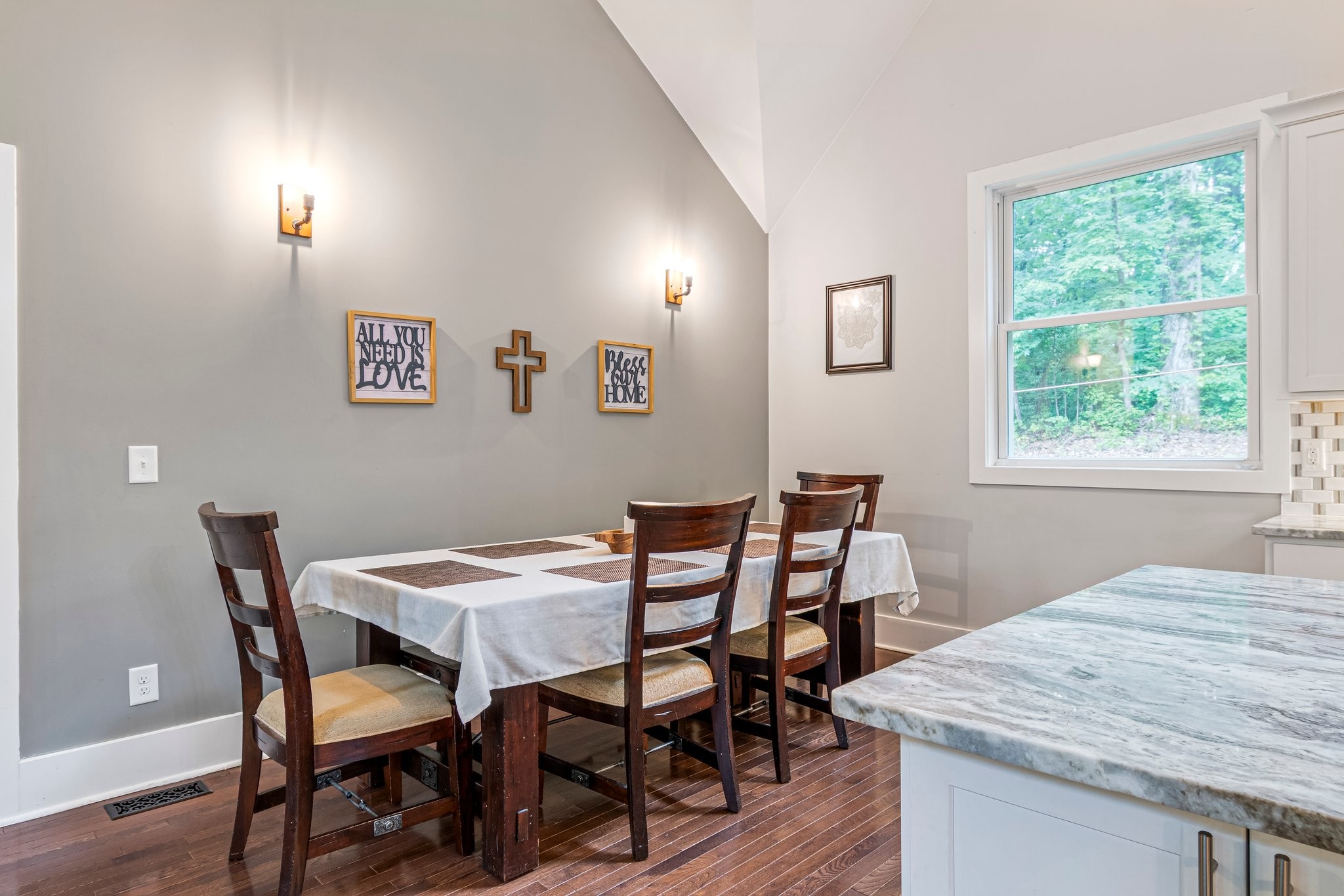 4545 Sears Road Pegram, TN 37143 - Photo 22 of 68 a dining room with a wooden table and chairs