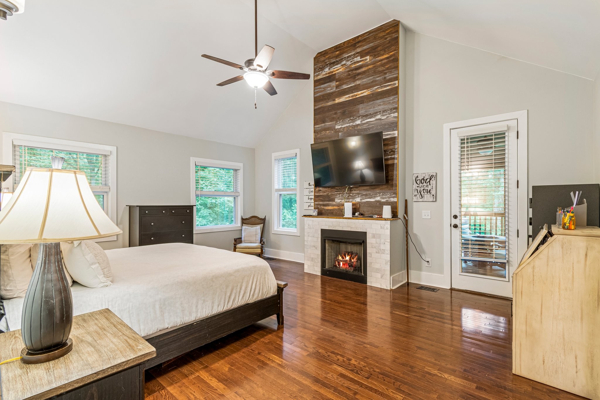 4545 Sears Road Pegram, TN 37143 - Photo 24 of 68 a bedroom with a bed and a flat screen tv