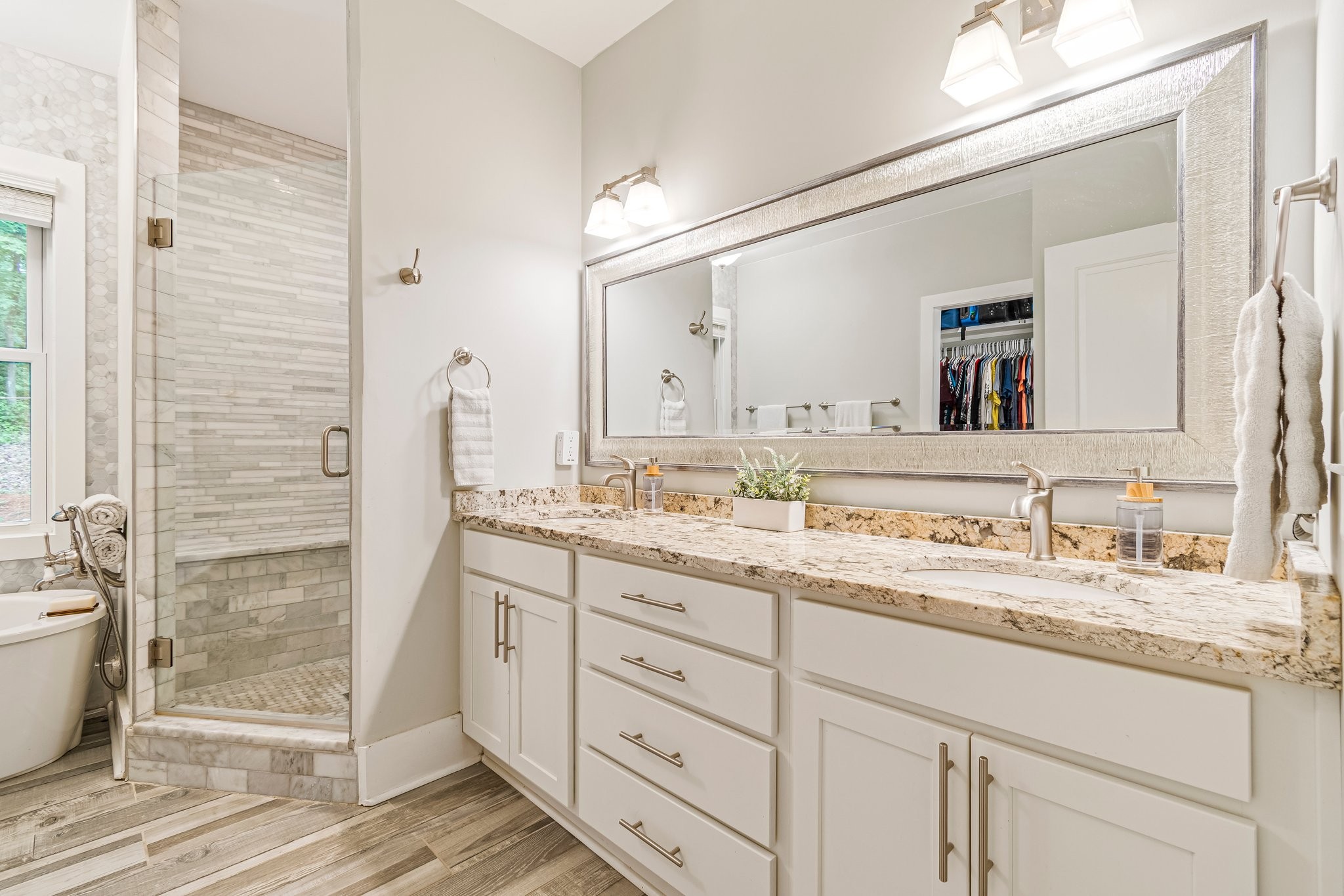 4545 Sears Road Pegram, TN 37143 - Photo 29 of 68 a bathroom with a granite countertop sink mirror and