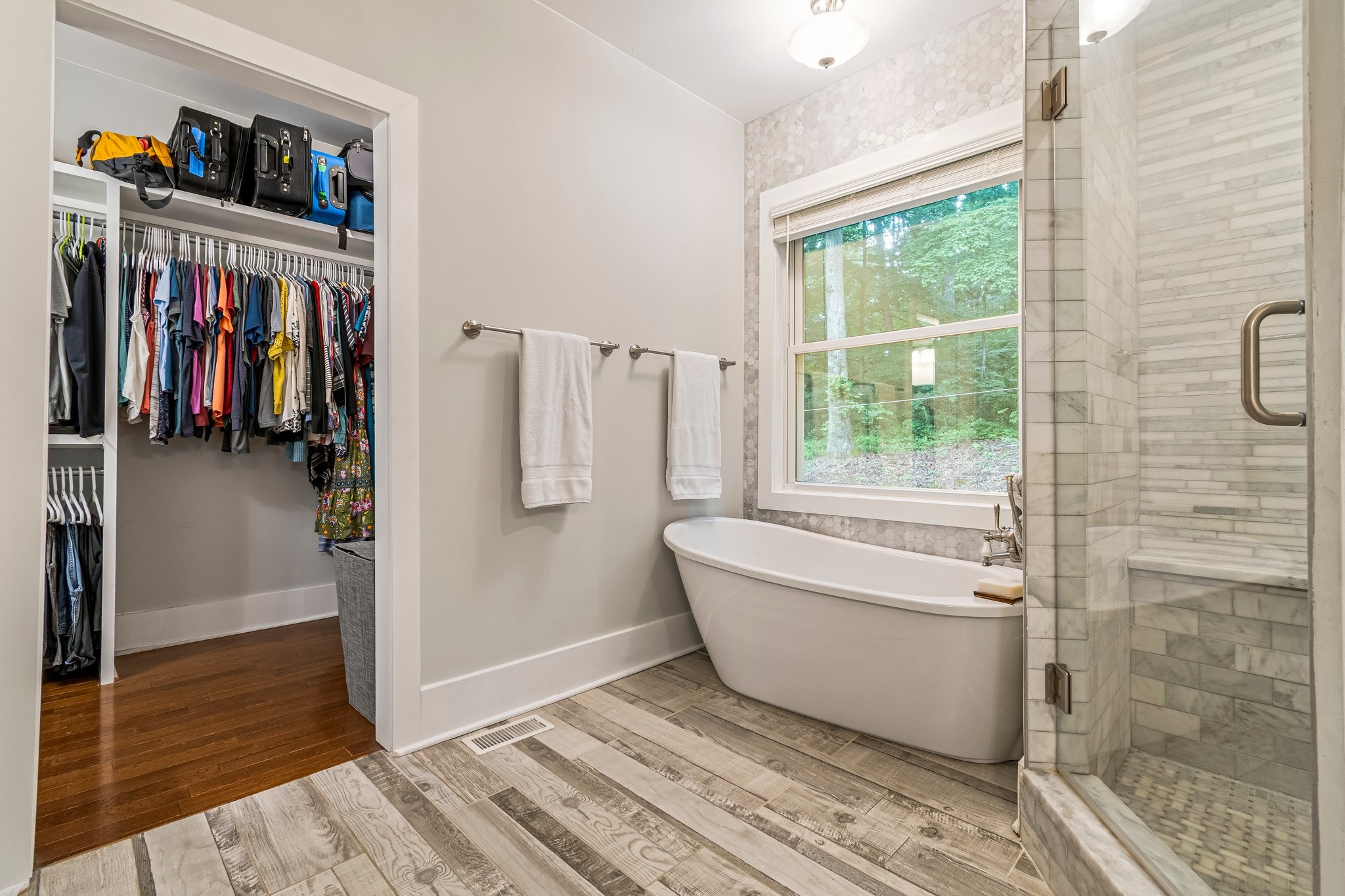 4545 Sears Road Pegram, TN 37143 - Photo 33 of 68 a spacious bathroom with a bathtub and a shower