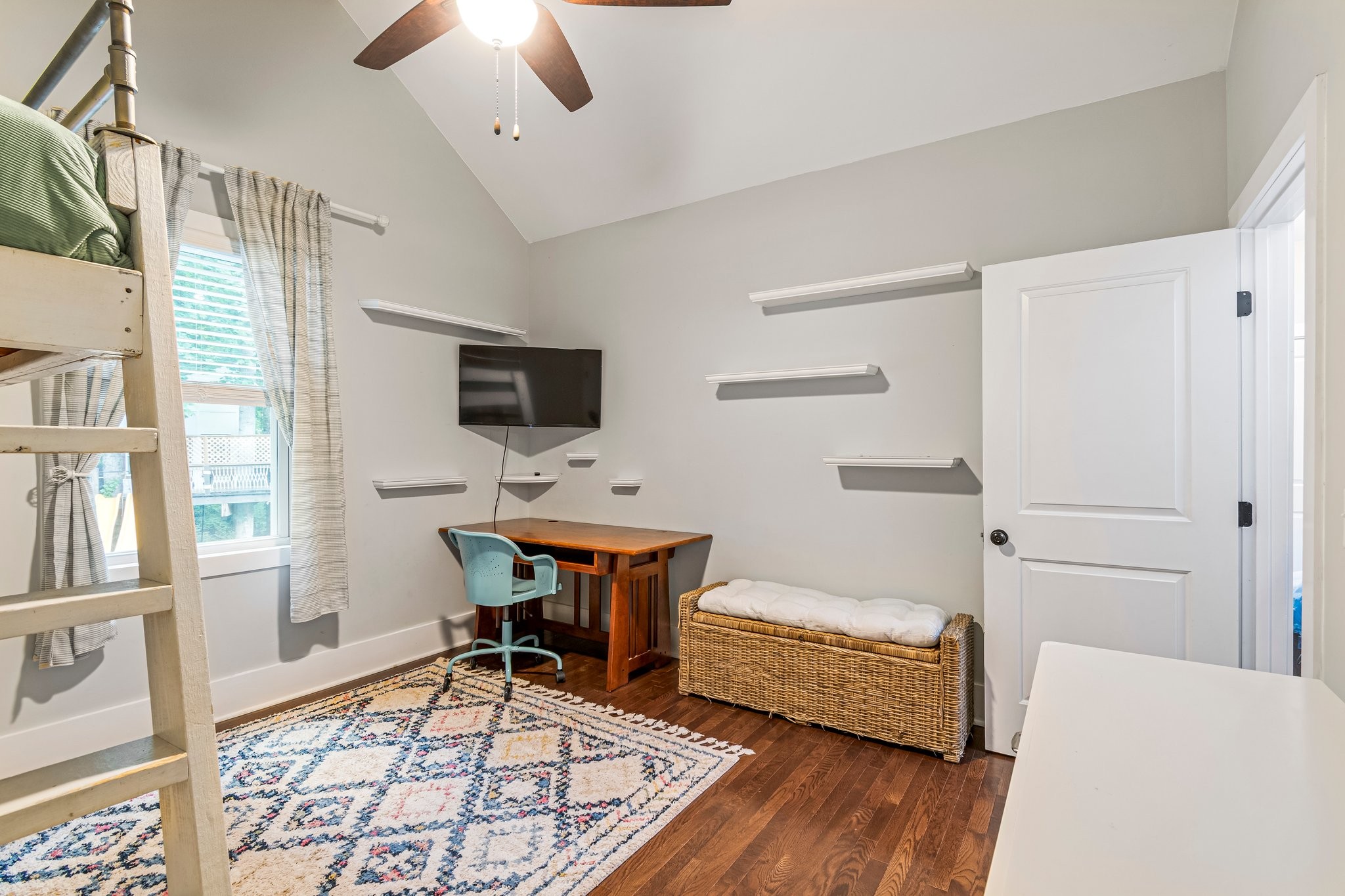 4545 Sears Road Pegram, TN 37143 - Photo 36 of 68 a bedroom with furniture and a wooden floor