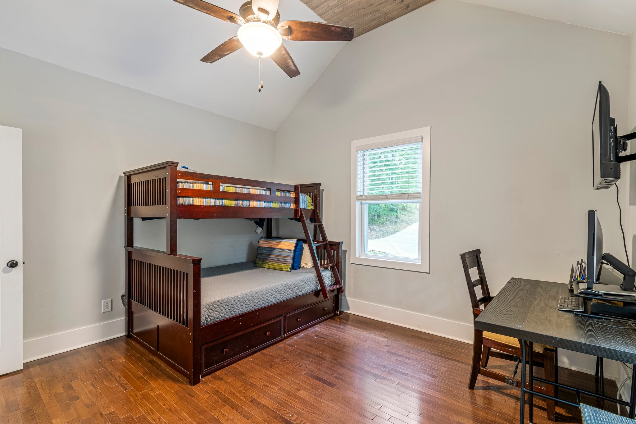 4545 Sears Road Pegram, TN 37143 - Photo 40 of 68 a bedroom with a bed and a desk