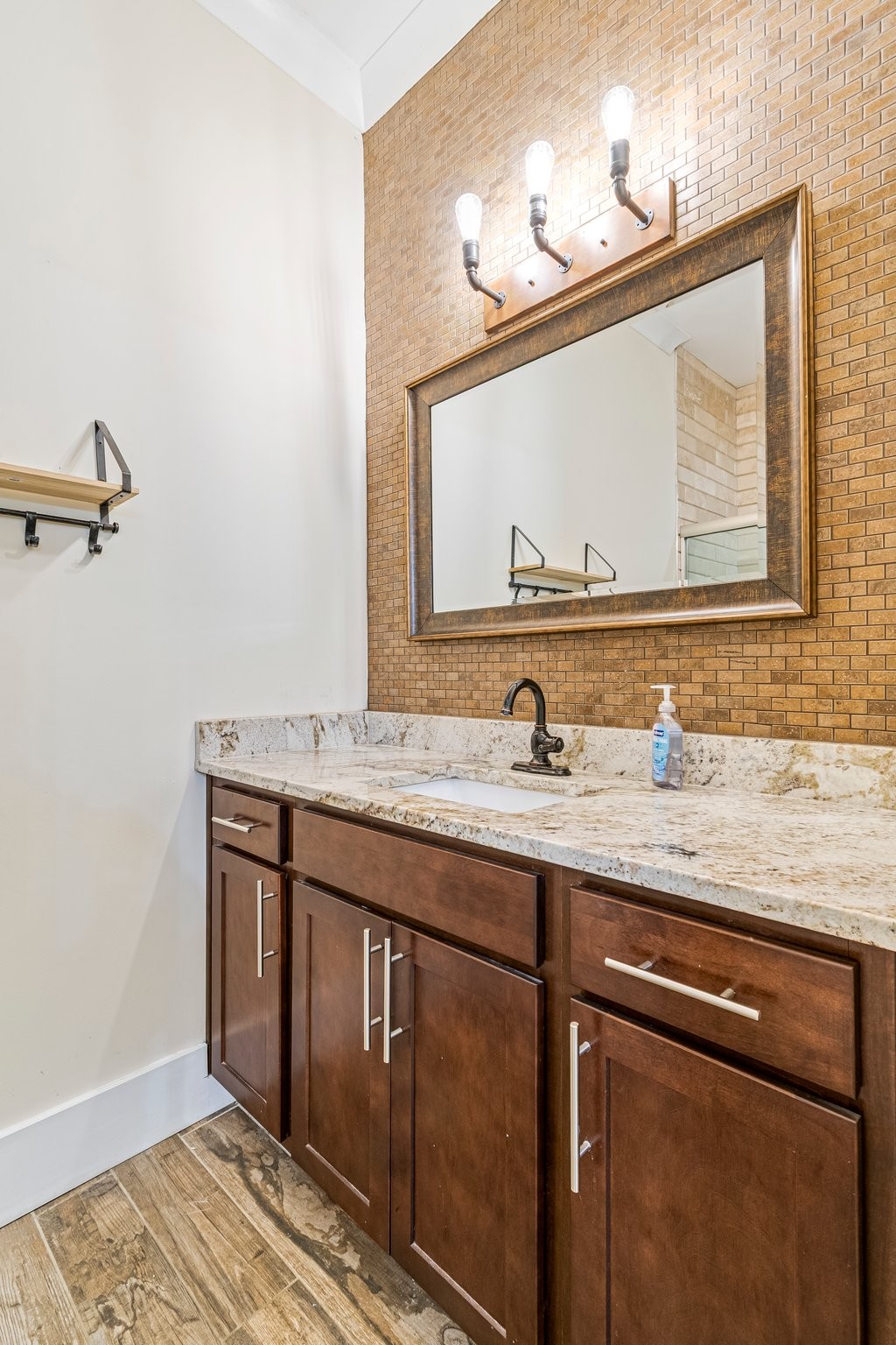 4545 Sears Road Pegram, TN 37143 - Photo 50 of 68 a bathroom with a granite countertop sink and a mirror