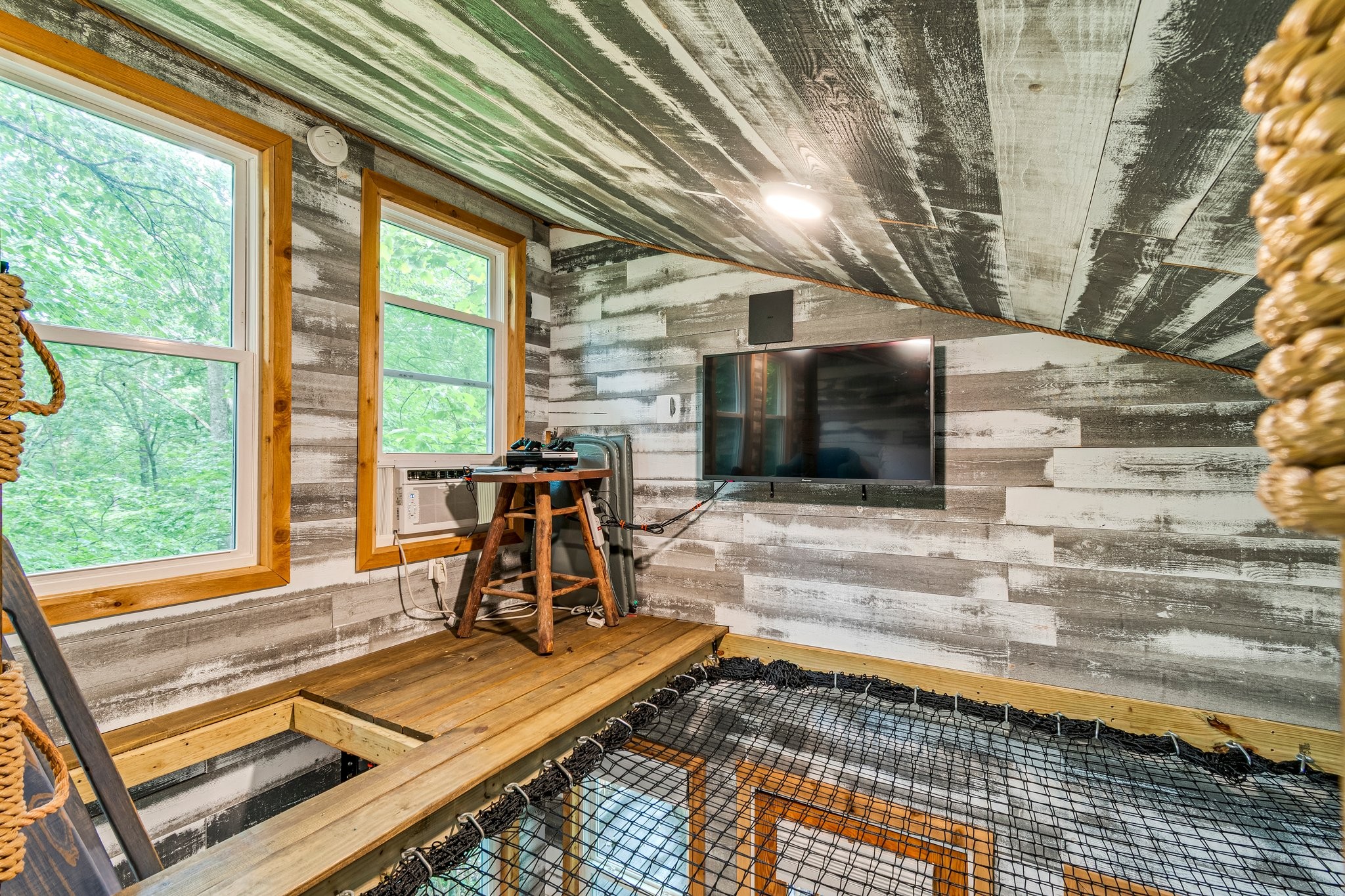 4545 Sears Road Pegram, TN 37143 - Photo 67 of 68 a view of a patio with table and chairs with wooden floor and fence