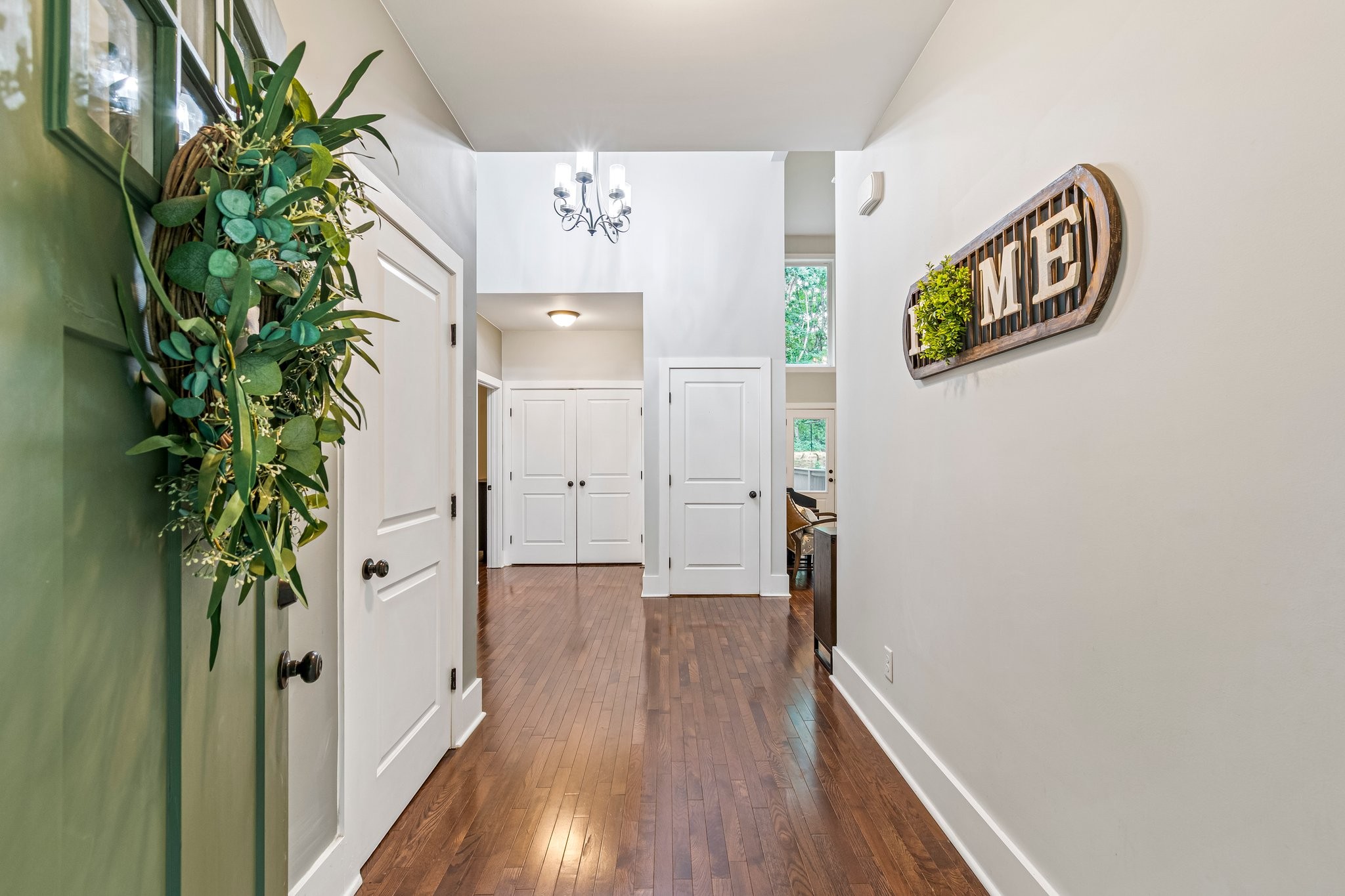 4545 Sears Road Pegram, TN 37143 - Photo 7 of 68 a view of a hallway with wooden floor and plant