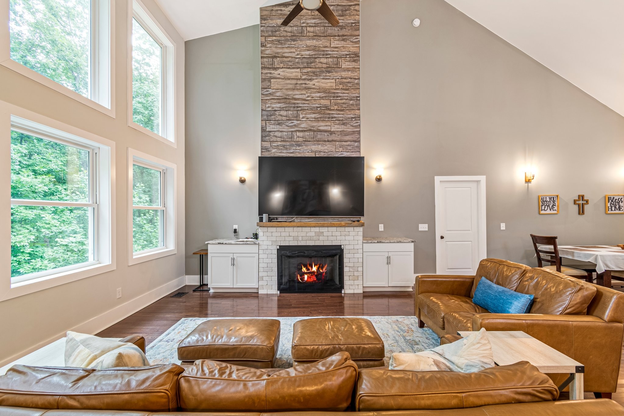 4545 Sears Road Pegram, TN 37143 - Photo 9 of 68 a living room with furniture flat screen tv and a fireplace