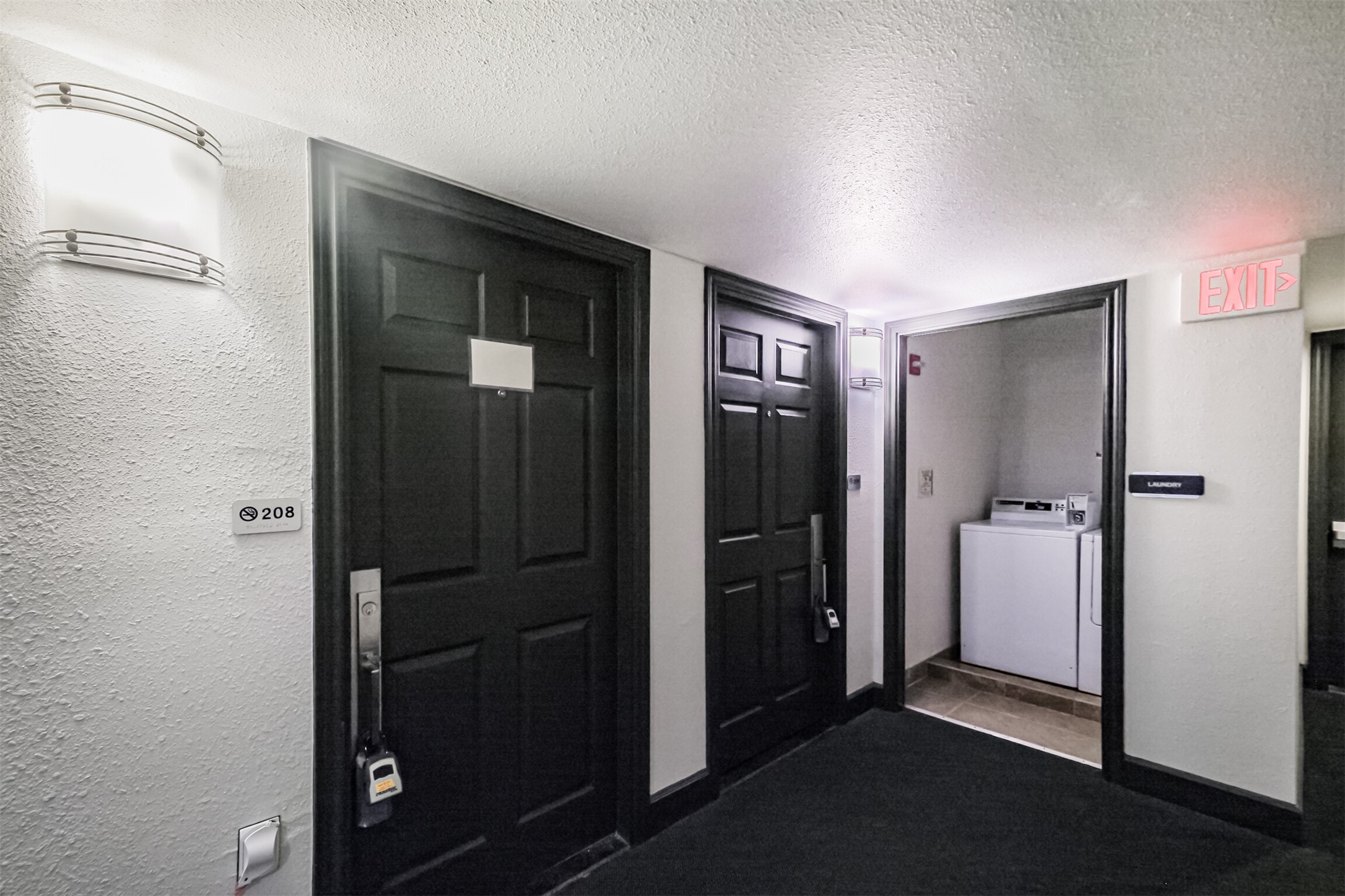 1025 Swanson Street, Unit 208 Houston, TX 77030 - Photo 9 of 19 a view of a hallway with closet area