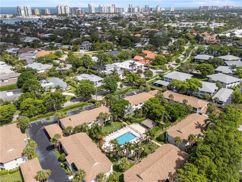3200 Binnacle Drive, Unit C1 Naples, FL 34103 - Photo 31 of 37 an aerial view of residential houses with outdoor space