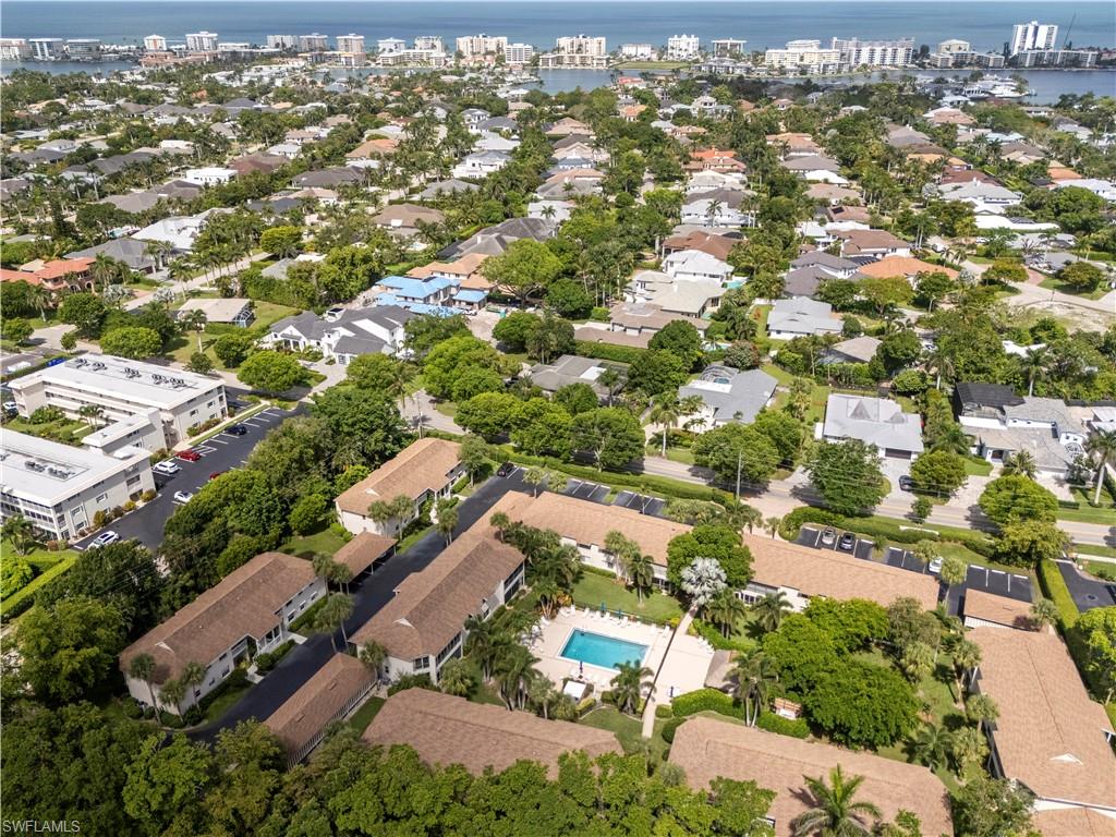 3200 Binnacle Drive, Unit C1 Naples, FL 34103 - Photo 32 of 37 an aerial view of residential houses with outdoor space