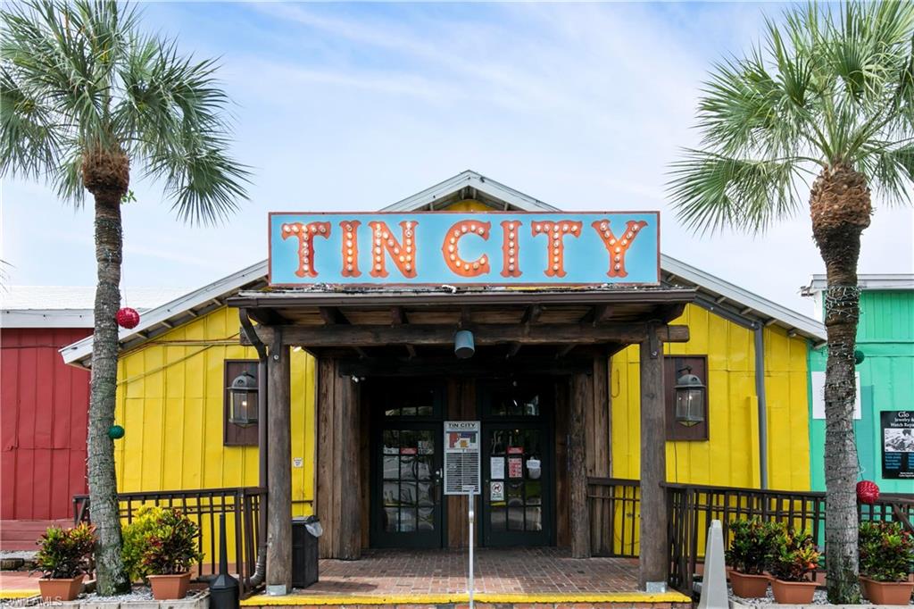 3200 Binnacle Drive, Unit C1 Naples, FL 34103 - Photo 33 of 37 a front view of a building with garden