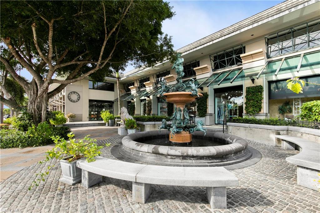 3200 Binnacle Drive, Unit C1 Naples, FL 34103 - Photo 36 of 37 a view of a house with backyard sitting area and garden
