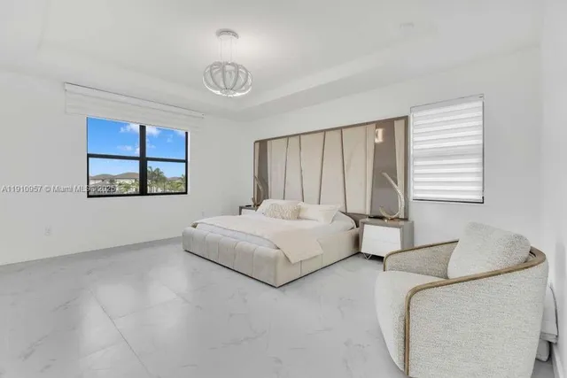 a kitchen with stainless steel appliances a sink stove and cabinets