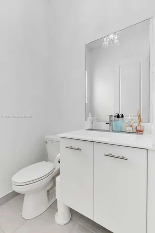 a view of a table and chairs in patio with a yard