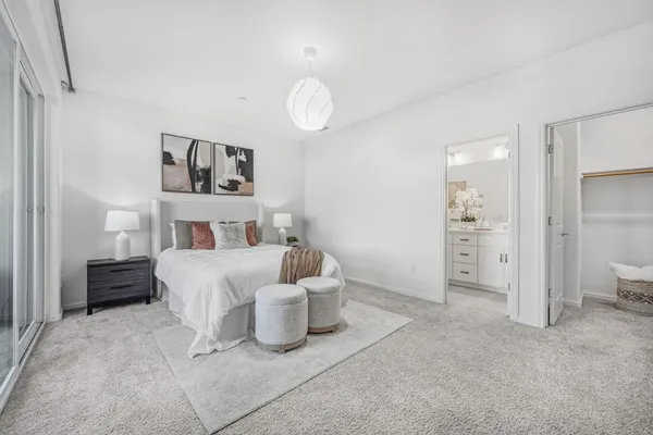 a bedroom with a bed and closet