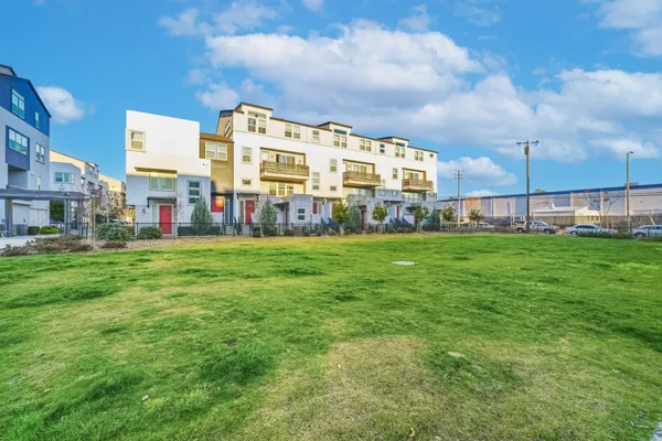a view of a building with a big yard