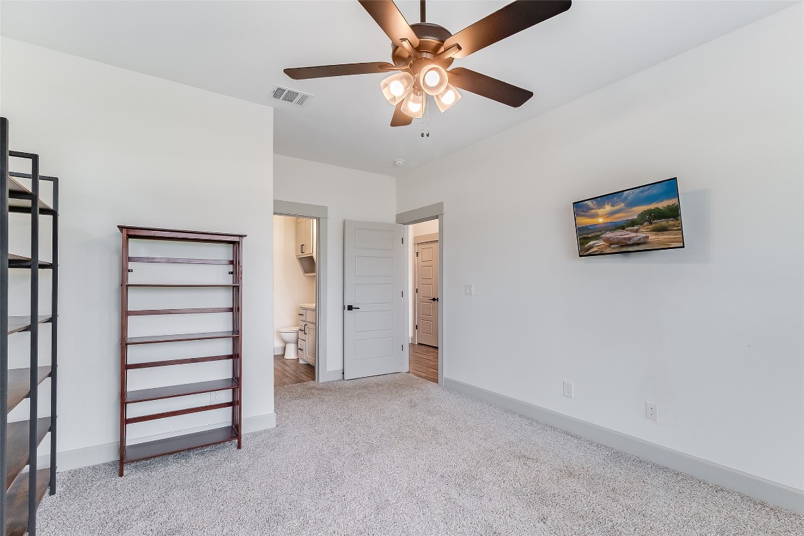 825 County Road 3152 Kempner, TX 76539 - Photo 21 of 34 a view of an empty room with a ceiling fan