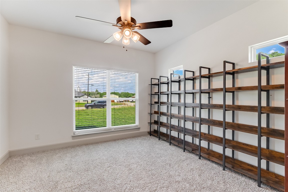 825 County Road 3152 Kempner, TX 76539 - Photo 22 of 34 a view of a livingroom with a bookshelf