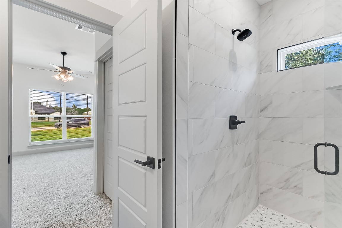 825 County Road 3152 Kempner, TX 76539 - Photo 23 of 34 a bathroom with a bathtub and shower