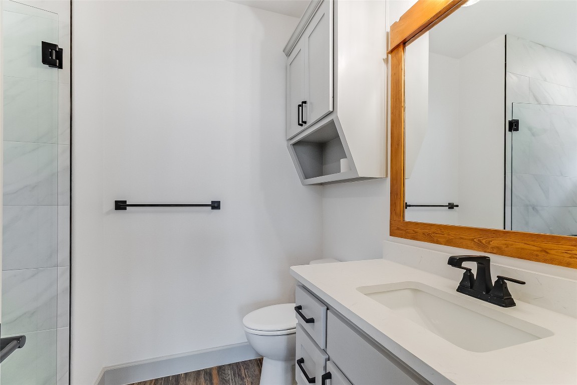 825 County Road 3152 Kempner, TX 76539 - Photo 24 of 34 a bathroom with a sink toilet and shower