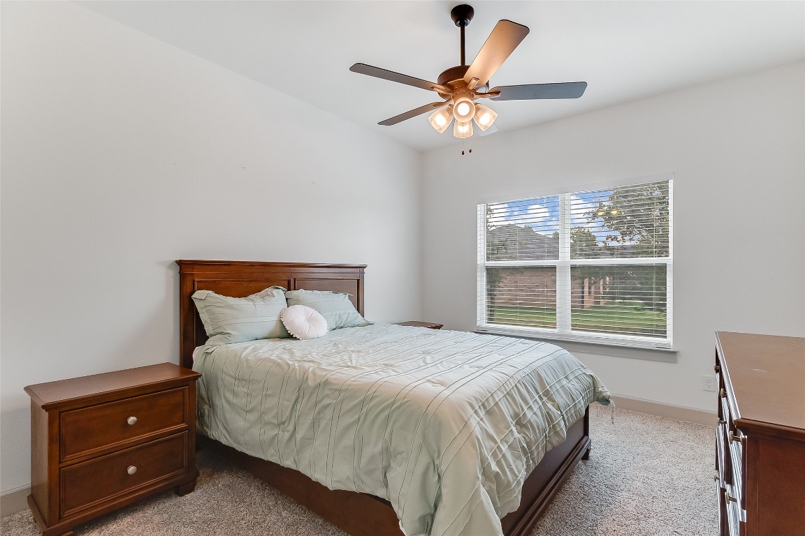 825 County Road 3152 Kempner, TX 76539 - Photo 25 of 34 a bedroom with a large bed and a window