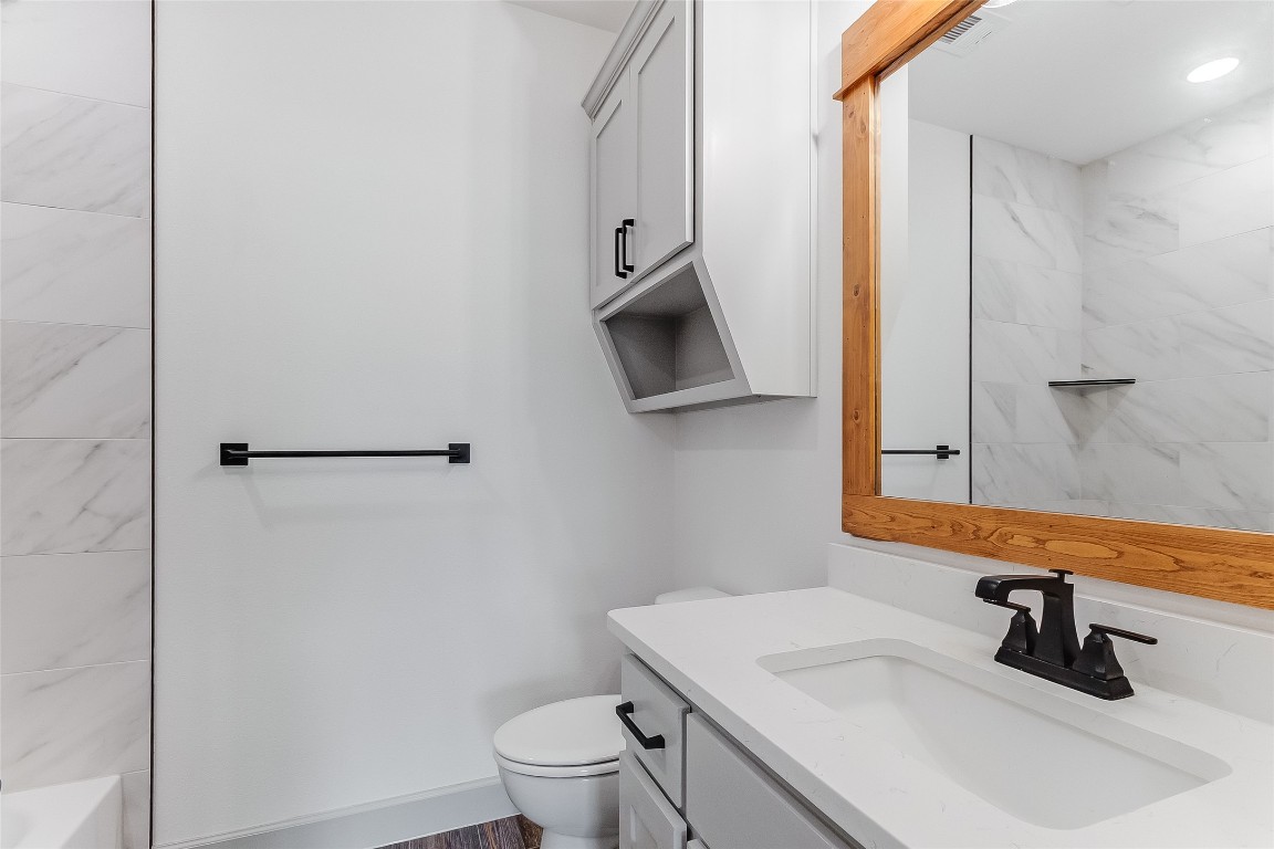 825 County Road 3152 Kempner, TX 76539 - Photo 30 of 34 a bathroom with a sink toilet and shower