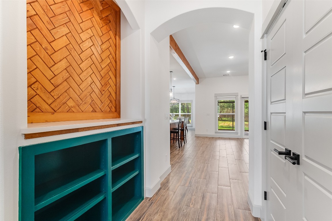 825 County Road 3152 Kempner, TX 76539 - Photo 4 of 34 a view of a hallway with wooden floor and a window