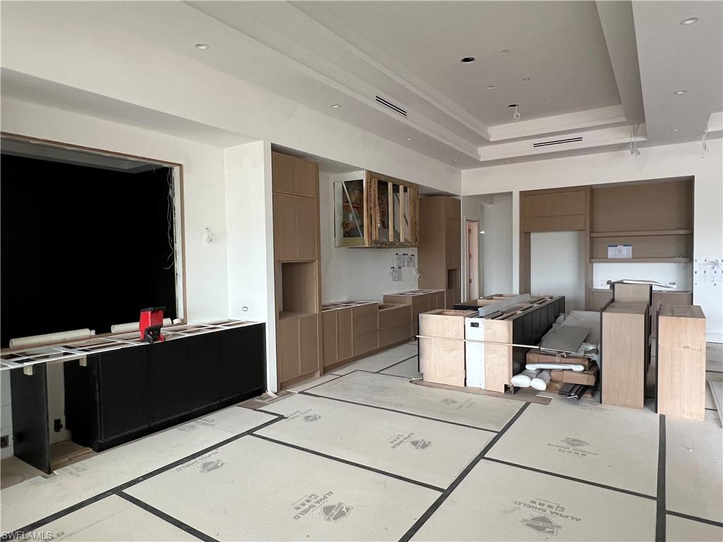 944 Chimney Rock Road Naples, FL 34120 - Photo 3 of 20 a kitchen with a stove and a refrigerator