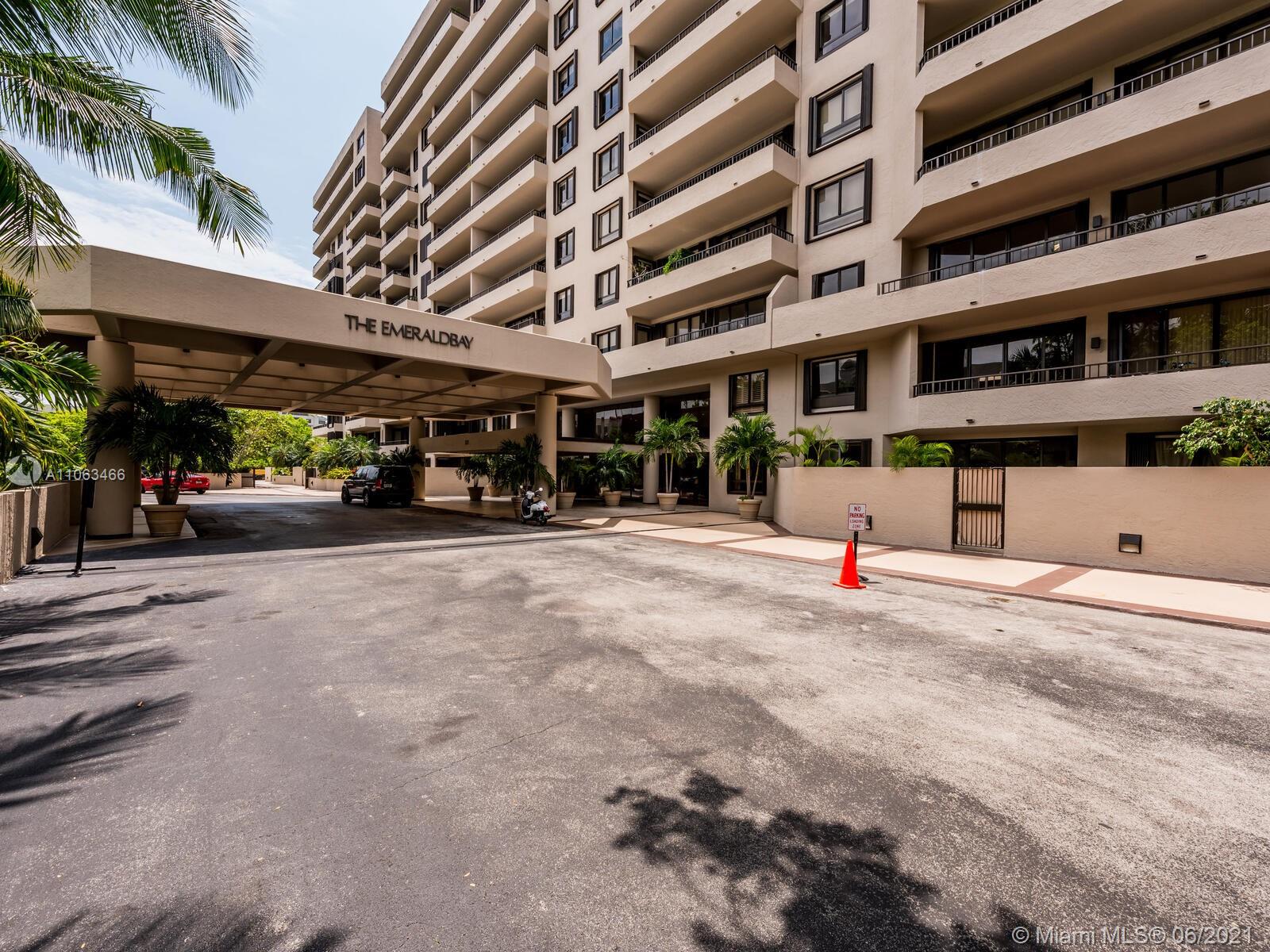 a view of a building with a road