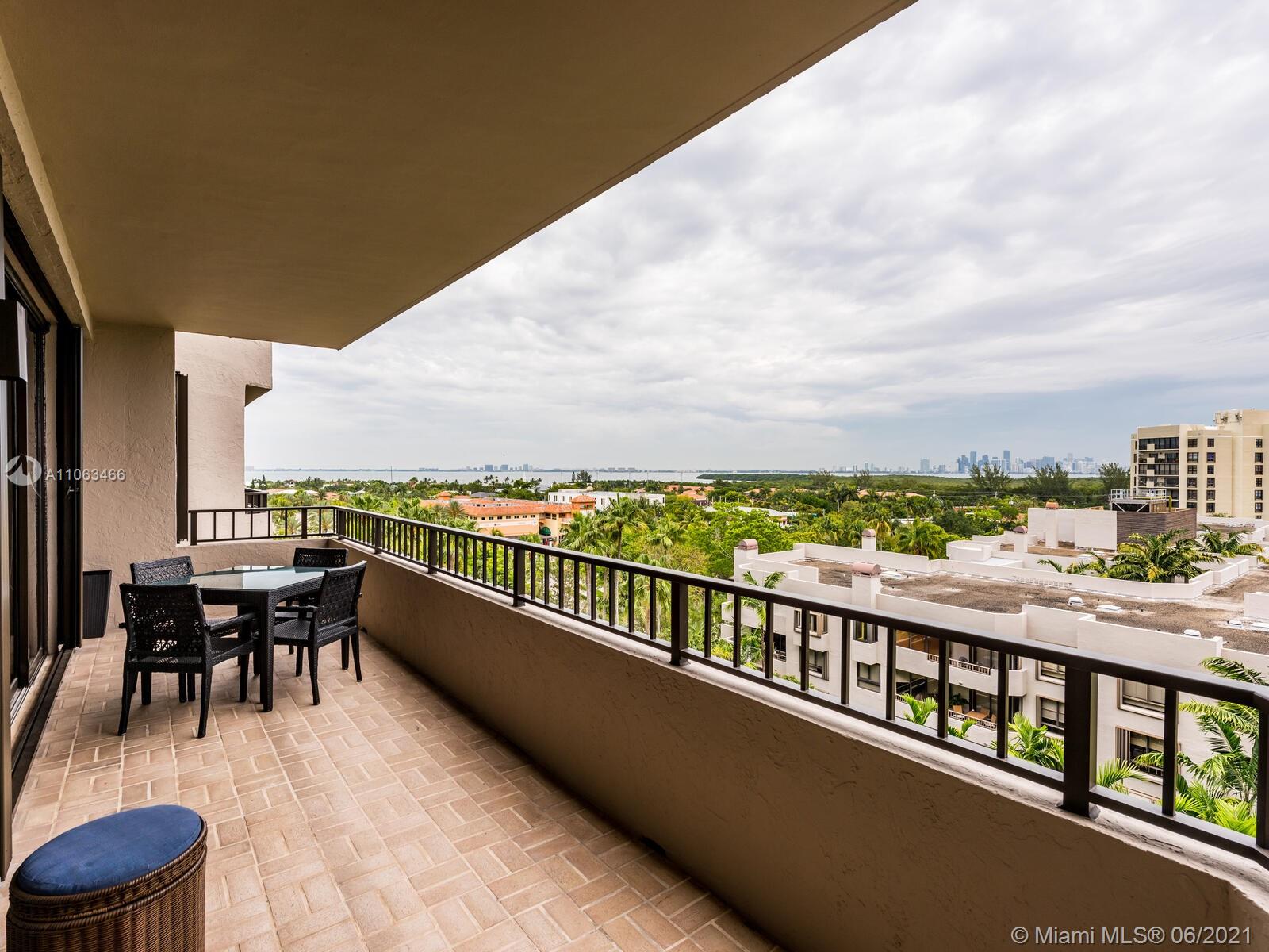 151 Crandon Boulevard, Unit 736 Key Biscayne, FL 33149 - Photo 21 of 38 a balcony with city view